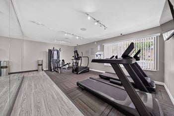 State-of-the-art 24/7 fitness and wellness center at drawbridge apartments in harrison township, mi.