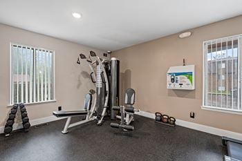 Updated 24-hour fitness and wellness center at knottingham apartments in clinton township, mi.
