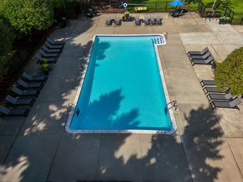 2 Heated swimming pools with sundecks at lakeside village apartments in clinton township, mi.