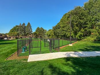Spacious dog park at lakeside village apartments in clinton township, mi.