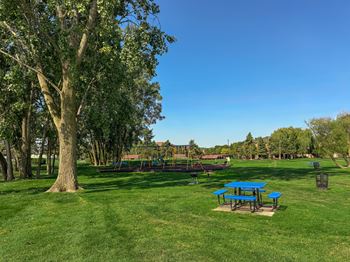 Spacious picnic areas at lakeside village apartments in clinton township, mi.