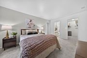 Southfield apartment for rent - Cozy bedroom with bathroom and ample storage at Park Lane Apartments in Southfield, MI.