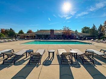 Heated pool and hot tub with sundeck at prentiss pointe apartments in harrison township, mi.