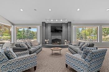 Community clubhouse with working lounge and billiards room at prentiss pointe apartments in harrison township, mi.