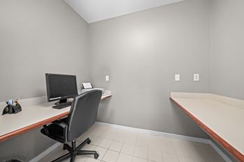 Community clubhouse with working lounge and billiards room at prentiss pointe apartments in harrison township, mi.