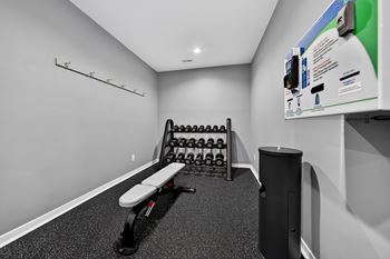 Updated 24-hour fitness and wellness center at westwood village apartments in westland, mi.