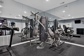 Updated 24-hour fitness and wellness center at westwood village apartments in westland, mi.
