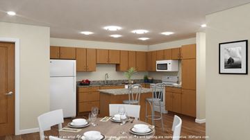 Holiday apartment for rent - A kitchen with a table set for two with a plant on the counter.