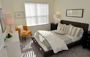 Minneapolis apartment for rent - Cozy bed and window at 1500 Nicollet Apartment Homes, Minnesota