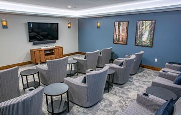 Apple Valley apartment for rent - a living room with chairs and a television