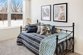 St. Cloud townhouse for rent - Blue Bedroom With Window at The Bluffs at Liberty Glen, Minnesota 56304