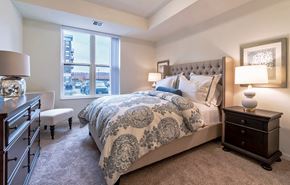 Minnetonka apartment for rent - Bedroom with bed at Bren Road Station 55+ Apartments, Minnesota