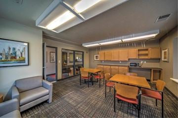 Davenport apartment for rent - a room with a table and chairs and a kitchen