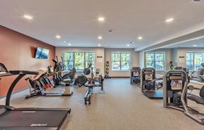Covington apartment for rent - Fitness Center with equipment at Covington Crossings 55+ Senior Living, Georgia
