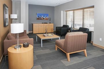 St Paul apartment for rent - a living room filled with furniture and a tv