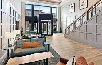 St. Paul apartment for rent - a living room with a couch and a staircase