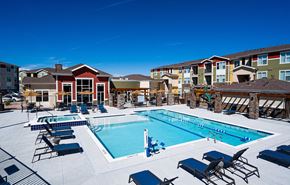 Parker apartment for rent - our apartments have a large swimming pool with chairs and tables