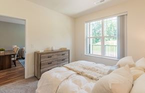 Lithonia apartment for rent - Model Bedroom at Stonepointe 55+ Apartments, Georgia