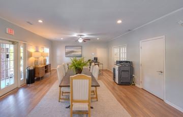Nashville apartment for rent - a living room and dining room with a table and chairs