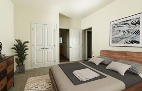 Phoenix apartment for rent - a bedroom with a bed and a painting on the wall at Aviara Flats, Arizona