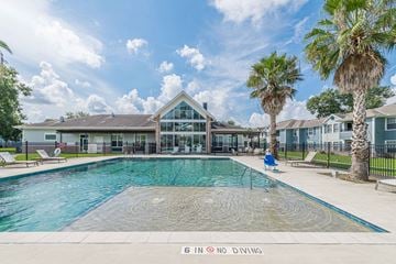 Houston apartment for rent - A pool with a sign that says "61G NO DIVING" in the foreground.