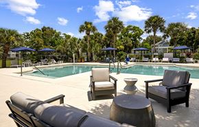Stuart apartment for rent - Poolside Lounge Chairs at The Lucille Apartments, Stuart