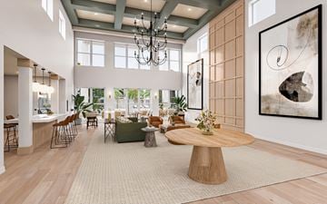 Kissimmee apartment for rent - A modern living room with a large wooden coffee table and a chandelier hanging from the ceiling.
