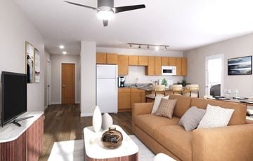 Surprise apartment for rent - A living room with a brown couch and a television.