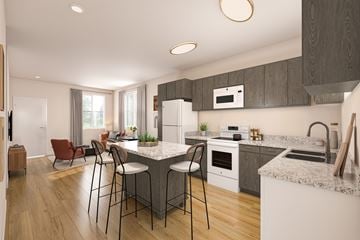 Maricopa townhouse for rent - A modern kitchen with a large island and bar stools.