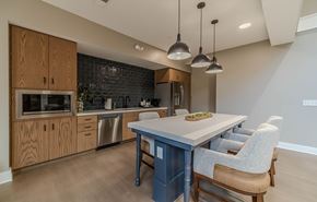 Union City apartment for rent - A kitchen with a table and chairs.