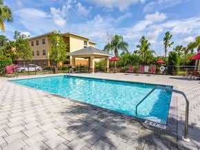 Lehigh Acres apartment for rent - A swimming pool with a 3 feet depth sign. at Heron Pond 55+ Apartments, Lehigh Acres, 33972