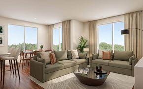 Apopka apartment for rent - A modern living room with a large window and a view of trees outside at The Mira Apartments, Florida