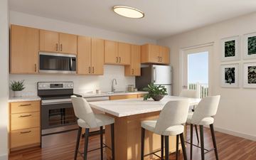 Apopka apartment for rent - A kitchen with wooden cabinets and a white countertop.