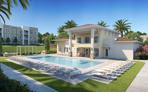 Apopka apartment for rent - A large white house with a pool in front at The Mira Apartments, Apopka, Florida