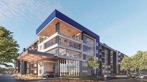 Glendale apartment for rent - Main office and amenity tower with glass windows.