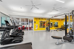 Marble Falls apartment for rent - A gym with a variety of equipment including treadmills, weights, and exercise machines.