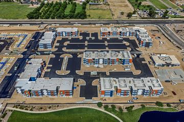 San Tan Valley apartment for rent - An aerial view of a large industrial area with multiple buildings and roads.