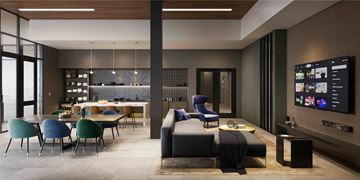 Glendale apartment for rent - A modern living room with a dining table and chairs, a sofa, and a television.
