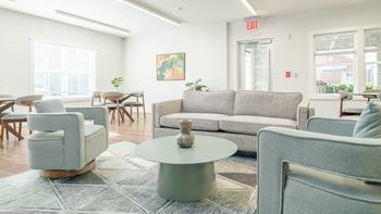 Furnished community room with connecting patio