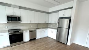 East Patchogue apartment for rent - Example of kitchen layout at The Grove Apartments