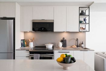 Quartz backsplash and countertops with undermount sink