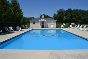 Somersworth apartment for rent - A pool with a small building next to it.