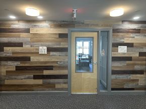 Concord apartment for rent - a sliding glass door in a room with a wooden wall