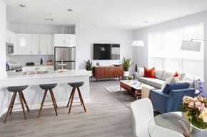 Quincy apartment for rent - a living room and kitchen in a modern apartment