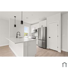 Lynn apartment for rent - A modern kitchen with a white countertop and stainless steel appliances.
