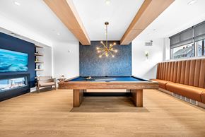 Beverly apartment for rent - A room with a pool table and a television.