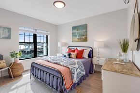 Beverly apartment for rent - a bedroom with a bed and a window