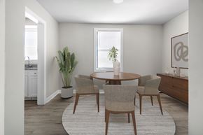 Brentwood apartment for rent - A dining room with a round table and chairs.