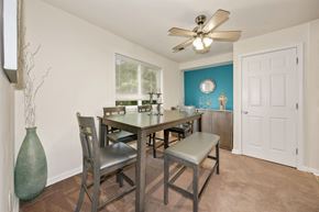 Columbia apartment for rent - A dining room with a table and chairs.