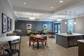 Baltimore apartment for rent - a large dining room with tables and chairs